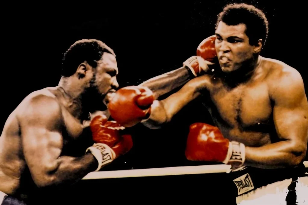 Muhammad Ali and Joe Frazier face off in the iconic Thrilla in Manila boxing match